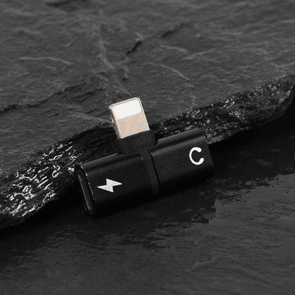 Compact 2-in-1 Lightning to headphone jack and charger adapter in black