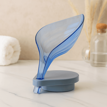 Leaf shaped soap drain holder for bathroom sink and shower
